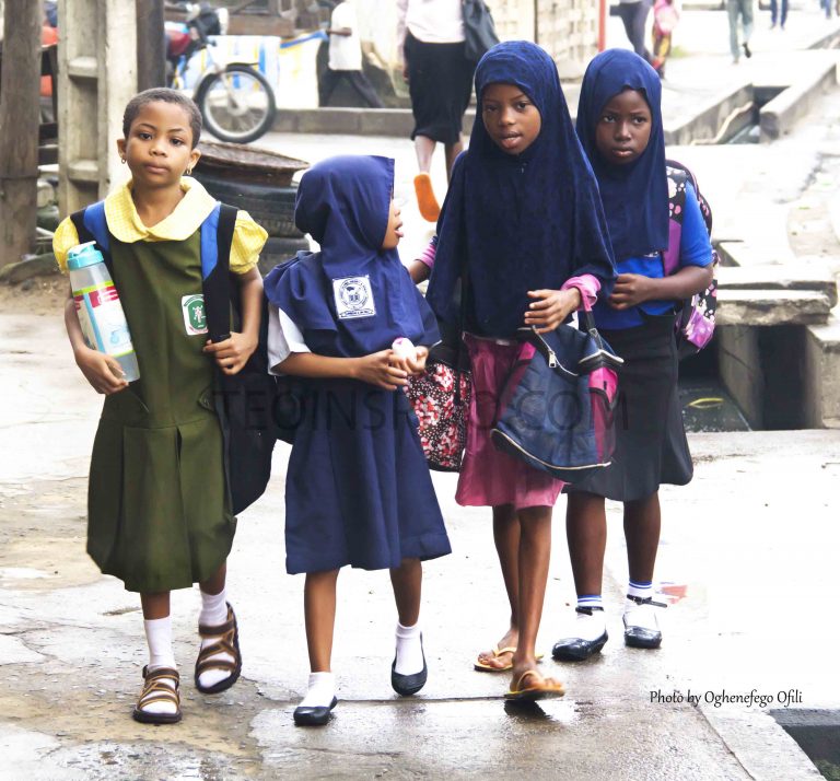 Access-to-basic-education-is-a-right.-As-these-girls-walk-to-school-they-enjoy-each-others-company