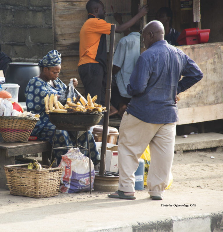 Waiting-to-buy-roasted-plantain-Oghenefego-ofili